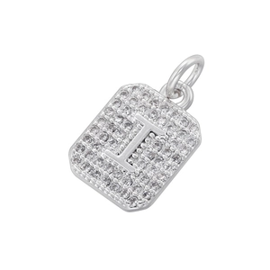 Close-up of silver-tone rectangular pendant with letter I and cubic zirconia inlay