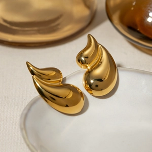 Minimalist 18k gold plated stainless steel double layer water drop earrings on ceramic tray