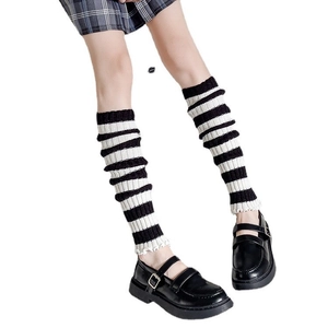 Classic black and white striped knit leg warmers for school style and Lolita outfits