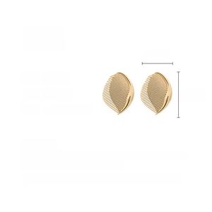 Detail view of gold alloy earrings with leaf texture, showing 4.4cm size and 18.4g weight