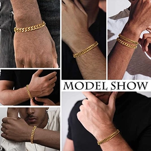 Model show of a chunky gold stainless steel curb chain bracelet in punk hip-hop style