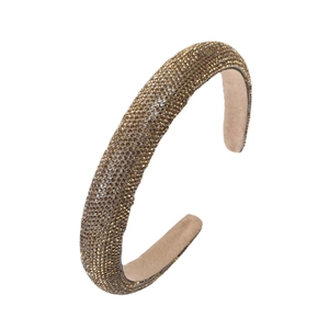 Sparkling rhinestone padded headband in vintage gold with soft velvet lining