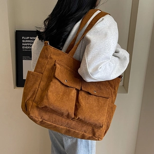 Brown corduroy tote bag with double front pockets and large capacity for daily use