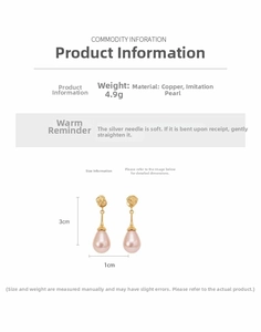 Detail view of gold teardrop pearl earrings with silver needles and size dimensions