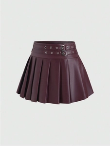 Detailed view of wine red PU leather pleated mini skirt with twin metal buckle accents