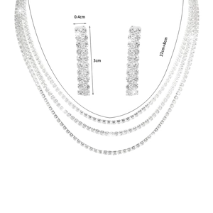 Detailed jewelry measurements showing necklace length and earring dimensions on white