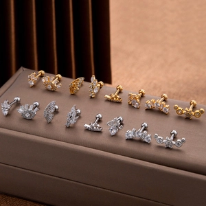 Collection of stainless steel cartilage studs with zircon butterfly and flower designs