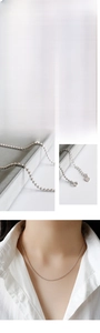 Detail view of S925 sterling silver 1.5mm ball chain with lobster clasp and heart tag