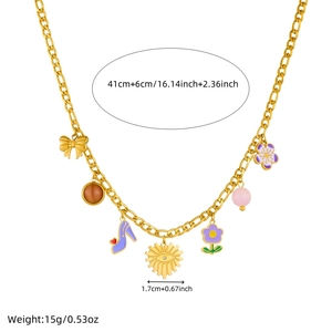 Gold stainless steel NK chain necklace with charms including heart, flower and bow