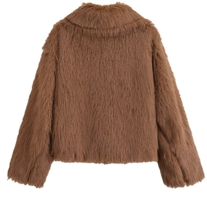 Detail shot of brown plush lapel jacket with thick faux fur texture and short cut design