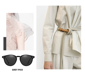 Classic black polar sunglasses with rivets and a beige braided rope belt detail