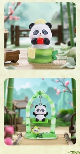 Detail of panda figurine sitting on a bamboo swing and in a bamboo tube base