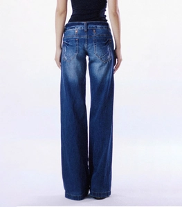 Close-up back view of vintage wash flare jeans with deep blue denim and rear pocket detail