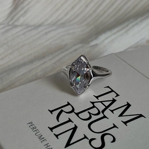 Minimalist silver ring featuring a large marquise cut cubic zirconia gemstone for women