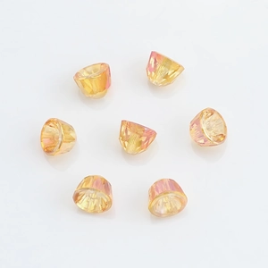 Macro shot of 8mm faceted champagne glass beads for DIY jewelry and Christmas pendants