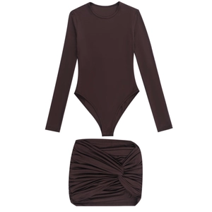 Flat lay of a dark brown long-sleeve bodysuit and ruched mini skirt set in high-stretch knit