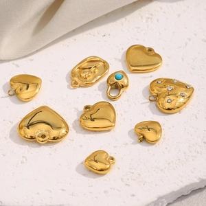 Set of 18K gold-plated stainless steel heart charms with floral engraving and crystals