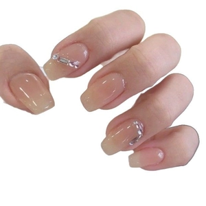Elegant nude pink gradient coffin fake nails with sparkling rhinestones and beads