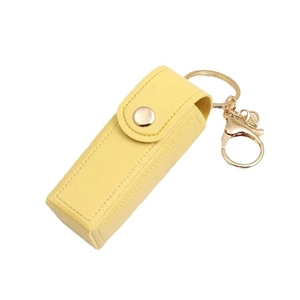 Mini yellow PU leather lipstick pouch keychain with gold metal clasp and snap button