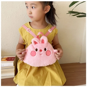 Pink plush rabbit backpack for kids with adjustable straps worn by a little girl