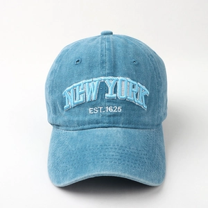 Detailed blue washed denim baseball cap with New York embroidery and six-panel stitching