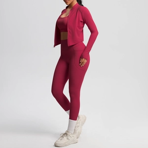 Detail view of pink sports set featuring high-waist pocket leggings and zip jacket