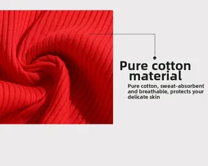 Detail of red ribbed cotton fabric showing breathable texture and skin-friendly material
