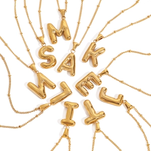 Golden balloon style initial pendant necklace with beaded stainless steel chain for women