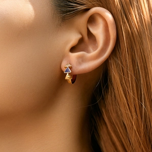Golden geometric triangle hoop earrings with blue enamel and micro-inlay zircon on ear