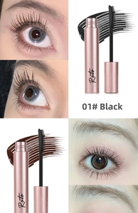 Macro view of Roto mascara brush head and black fiber texture for long curly lashes