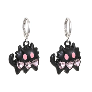 Detail view of black cat drop earrings with pink heart stones and silver metal hoops