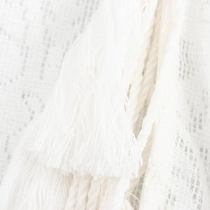 Sweet white lace blouse with tie-front, fringe details, and knit texture long sleeves