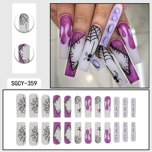 Halloween purple coffin press-on nails set with spider web and BOO lettering art