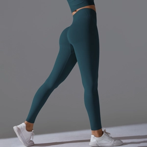 Detail of high-waist seamless yoga leggings with scrunch butt lift and sculpting texture