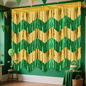 Detail of green and gold wave tinsel foil curtain for birthday party backdrop