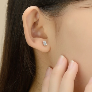 Elegant S925 sterling silver rectangular zircon stud earrings worn on earlobe