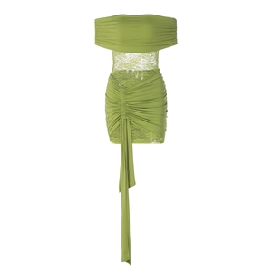 Detail of green off-the-shoulder dress with lace waist panel and pleated ruffle hem