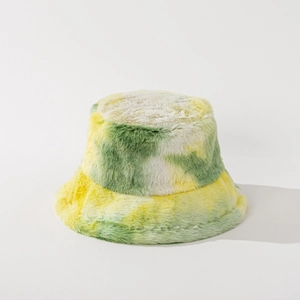 Close-up of soft plush tie-dye bucket hat showing yellow and green faux fur texture