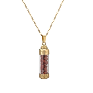 Detail of gold perfume bottle pendant with red stones and Greek fret pattern