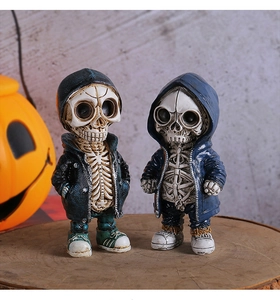 Detail of streetwear resin skeleton figurines in hoodies for Halloween desk decor