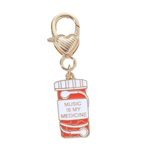 Fashionable enamel headphone pendant charm with Music Is My Medicine text and heart lobster clasp