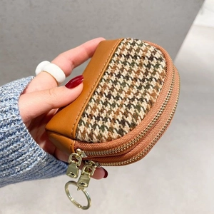 Mini houndstooth canvas coin purse with brown leather trim and golden metal zippers