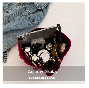 Spacious velvet tote bag interior showing capacity for tablet, phone, and cosmetics