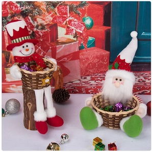 Detail of Christmas Santa and Snowman candy baskets made of plush and bamboo weave