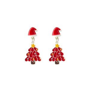 Close-up of festive Christmas tree and red Santa hat pendant drop earrings set