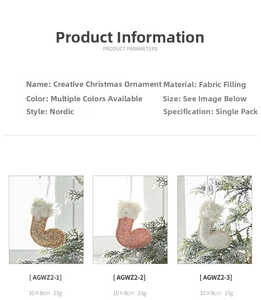 Detailed view of Nordic style fabric Christmas stocking ornaments in gold, pink, and silver