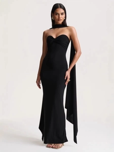 Elegant black halter neck long dress with twisted bust detail and a long flowing scarf