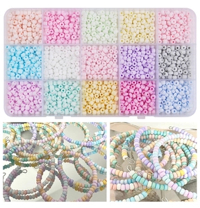 Detail of 4mm colorful frosted glass beads in a storage box for DIY jewelry making
