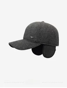 Detail view of winter baseball cap showing thick wool fabric and protective ear flaps