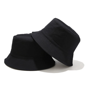 Solid black double-sided bucket hat with foldable canvas fabric for outdoor sun protection